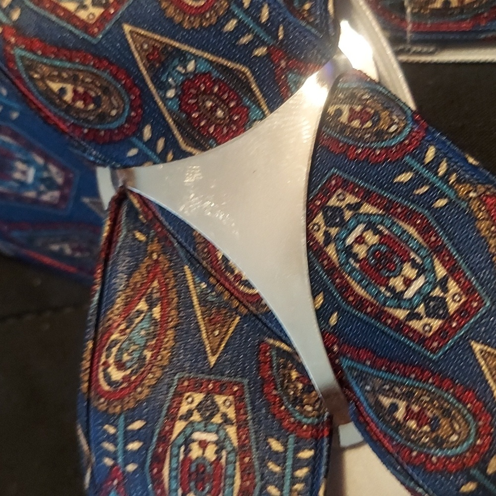 Retro high fashion. Vintage silk suspenders made In west Germany. CAS.